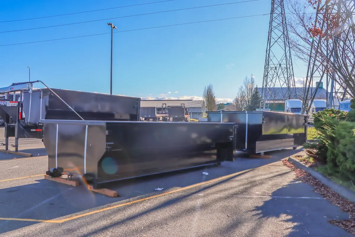 Roll-off dumpster ready for waste disposal at job site for Construction Dumpster Rental in Fountain